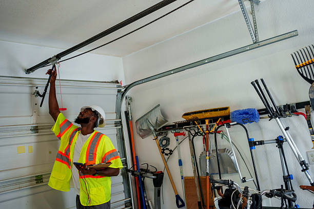 Professional Garage Door Panel Replacement technician working in Yale, OK